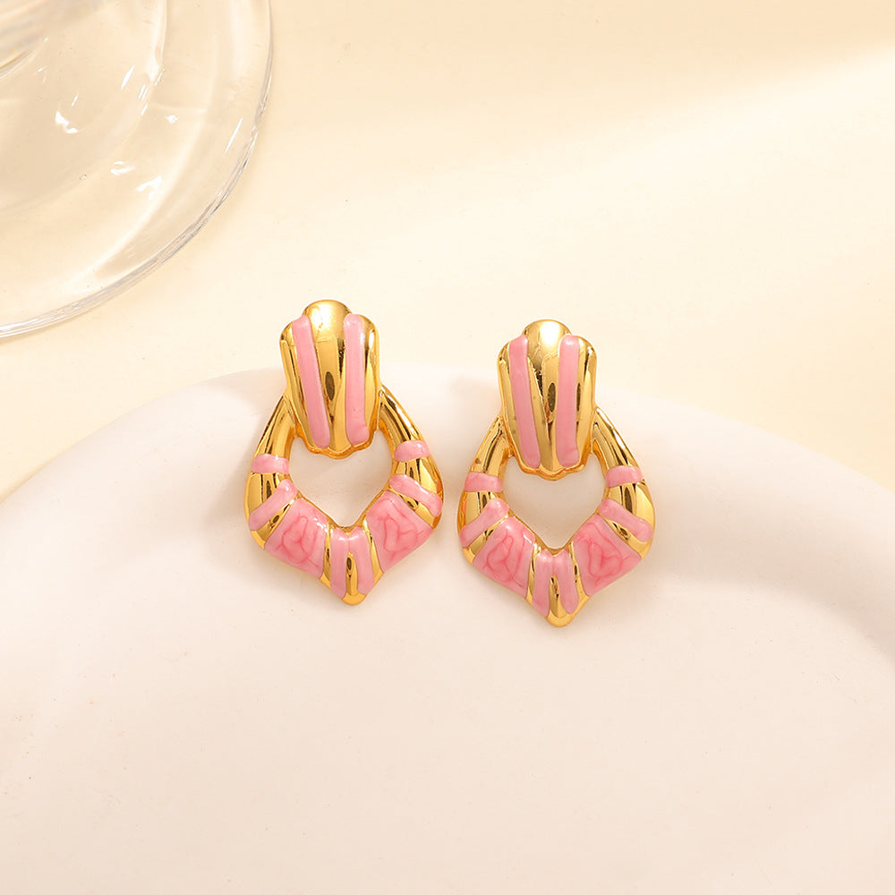 Ladies earrings in elegant shell design Nin Boutique