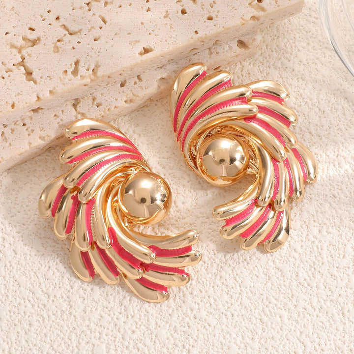 Ladies earrings with ornate wave pattern Nin Boutique