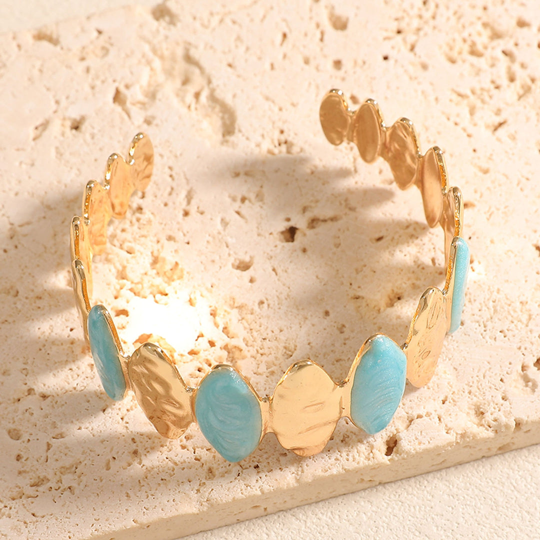 Women's Open Bangle made of fine metal with elegant motif Nin Boutique